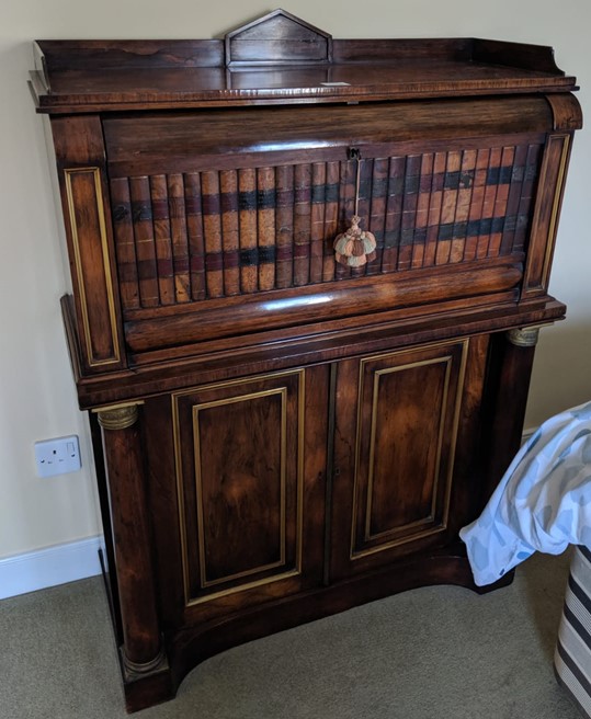 A Regency brass mounted rosewood secretaire a abbatant,